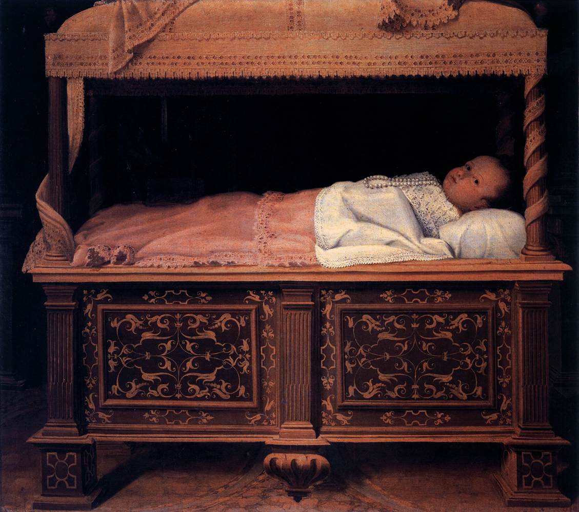 Portrait of a Newborn in a Cradle