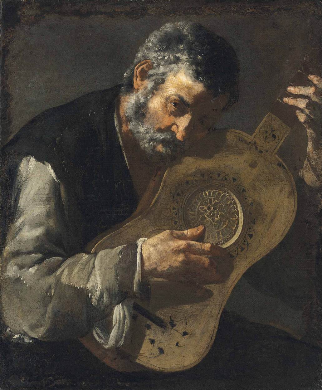 A Man Playing the Guitar