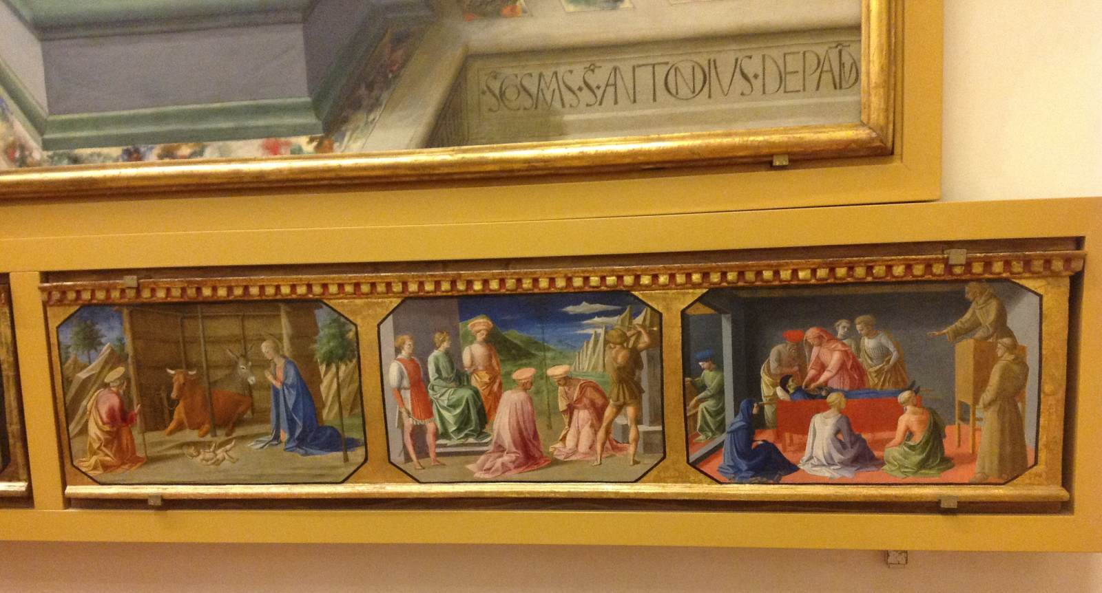 Three scenes from a predella