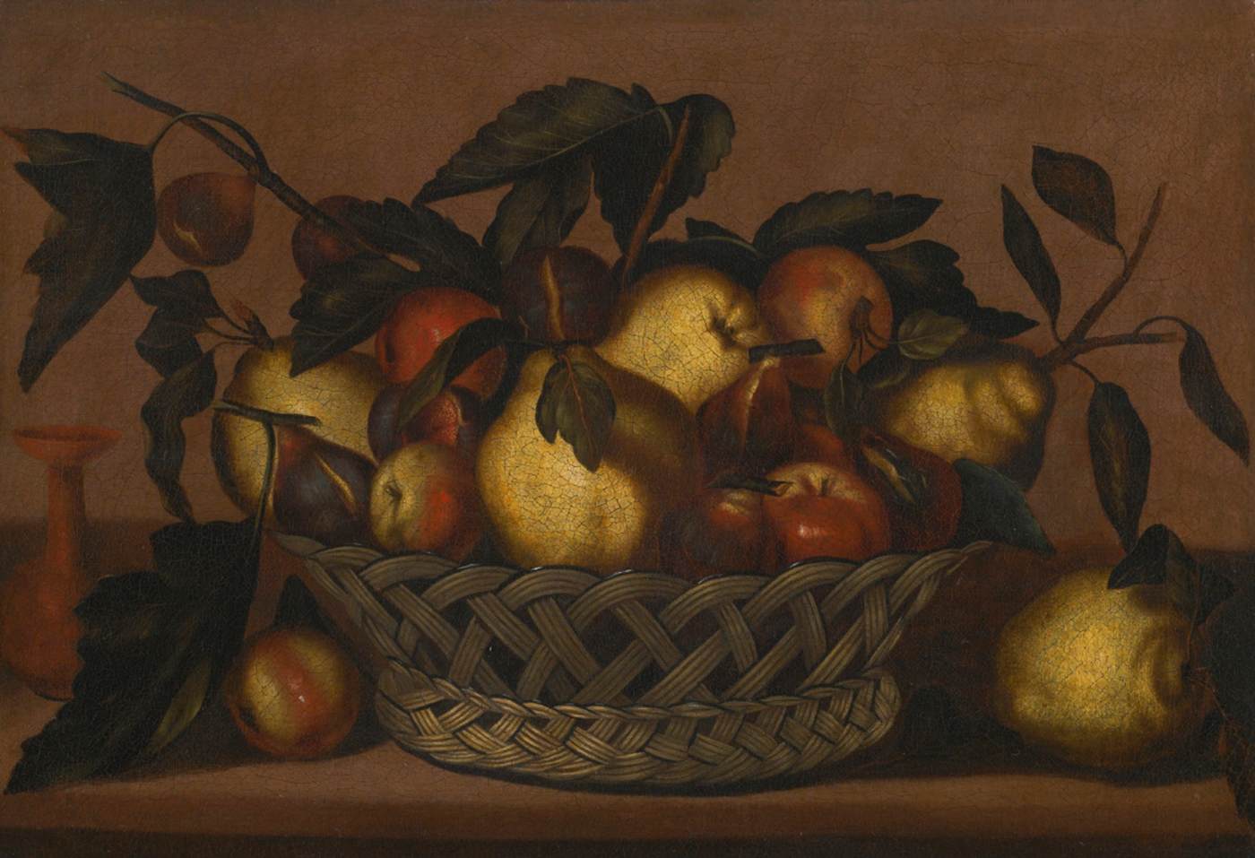 Still-Life of Apples, Pears and Figs in a Wicker Basket on a Stone Ledge