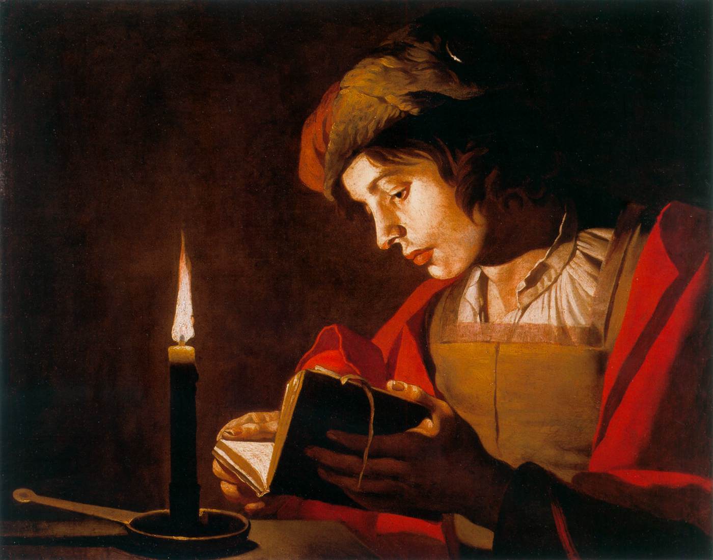Young Man Reading by Candlelight
